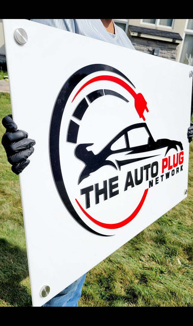  The acrylic 3d sign features the 'THE AUTO PLUG NETWORK' logo with a black car silhouette, red and black circular graphic elements, and the text 'THE AUTO PLUG NETWORK'. 3d signs in Toronto, canada