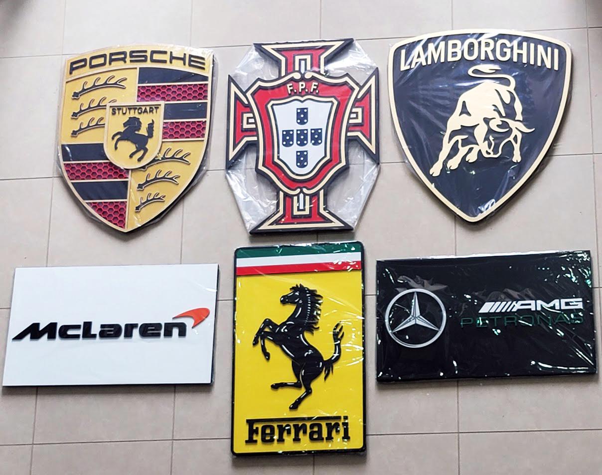 3d automotive-themed wall decals or signs featuring Porsche, Portugal, Lamborghini, McLaren, Ferrari, and Mercedes-AMG logos signs wall art